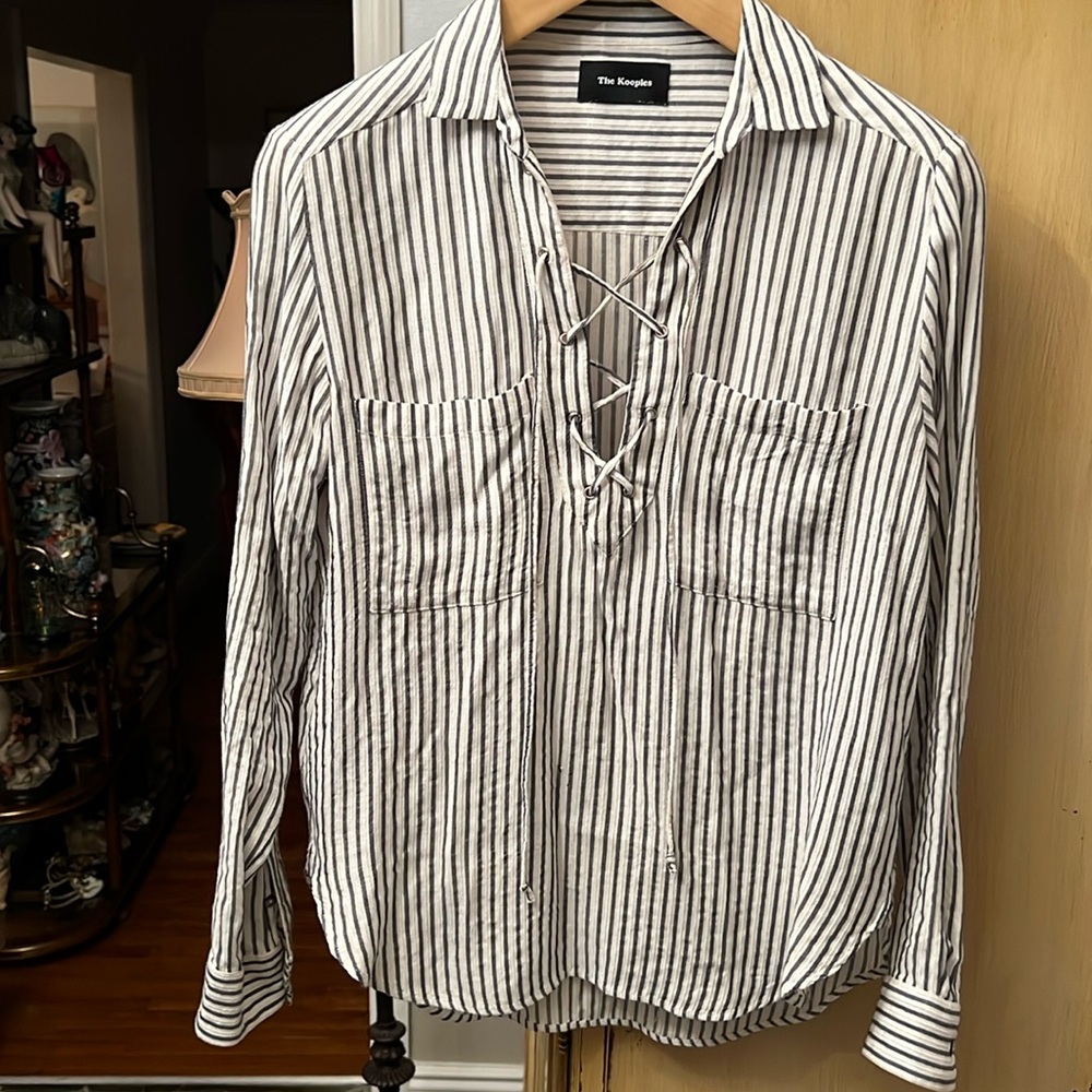 Strip blouse by The Kooples size 3
80% viscose 20% cotton